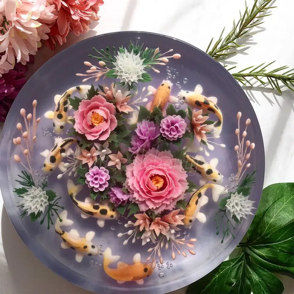 Gelatin based cake injected into the jelly to make flowers and fishes pattern